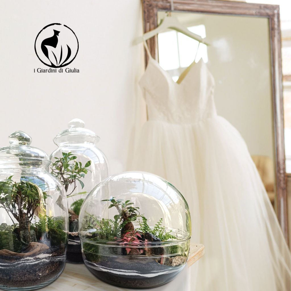 Terrari in vetro con abito da sposa