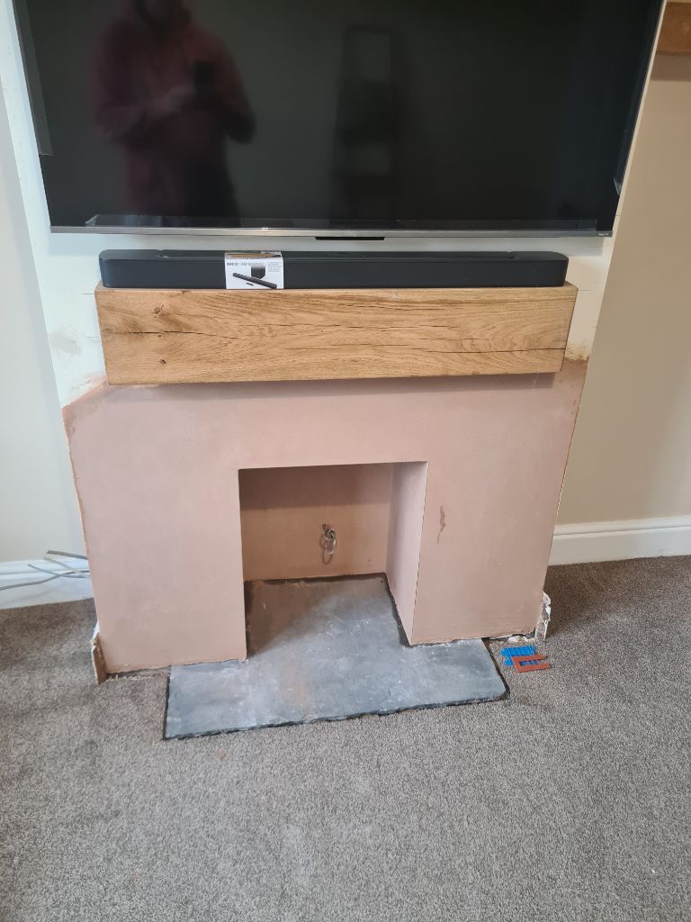 Plastered fireplace area