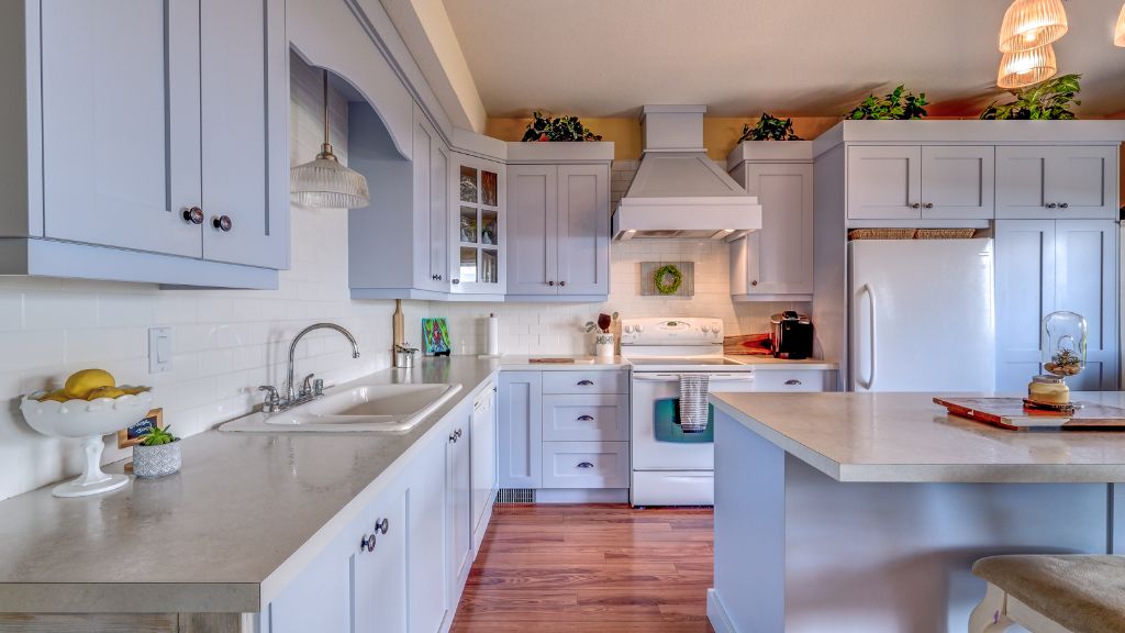 Modern kitchen with light gray cabinets